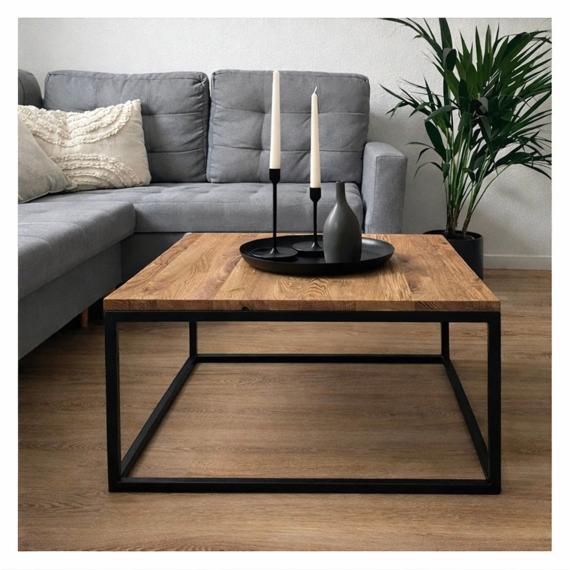 Schwarzer Couchtisch mit Holzplatte und Metallgestell