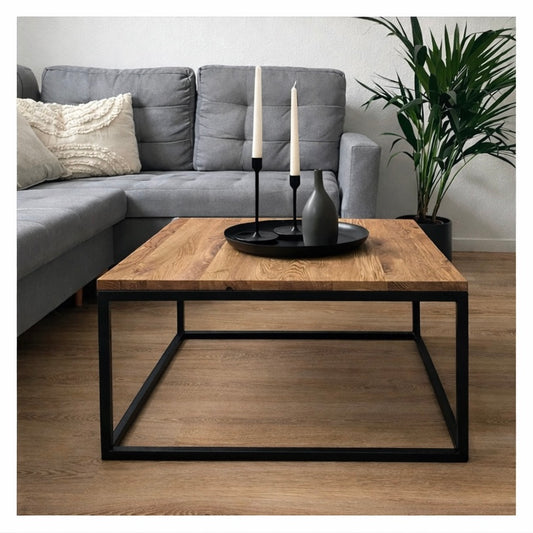 Schwarzer Couchtisch mit Holzplatte und Metallgestell